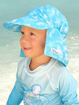 The Original Flap Happy Hat UPF 50+: Designed to provide excellent sun protection from damaging UV rays. The hat has a large brim to shade the face and the flap covers the ears and neck from the harsh rays of the sun with an elastic band to help fit snuggly around the head. This hat looks terrific when paired with Flap Happy Swimwear or Playwear. Perfect and practical for any outdoor or water activity! Fabrication: 100% Polyester, 100% Cotton Lining