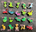 DELETE DUPLICATE Pick your own Cartoon Dinosaurs shoe charms