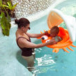 Baby Pool Float Sonny the Sea Creature Neon Orange