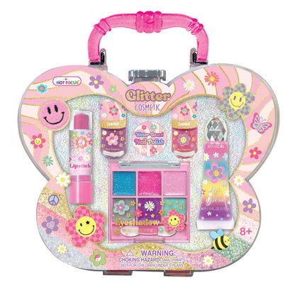 Create the glitteriest looks for all glitter lovers with this cosmetic set! Comes with reusable carry case! Contains: 1 Reusable acrylic case 1 Lips gloss 1 Lipstick 1 glitter eyeshadow palette 2 Scented water-based nail polishes 1 Eyeshadow applicator