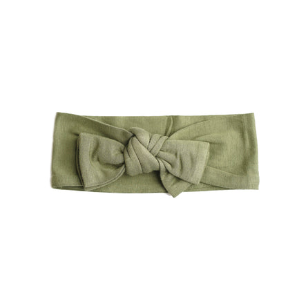 The softest bamboo baby headbands ever! Pair these adorable accessories with onesies, dresses, bloomers, and gowns for the cutest girl outfits. Color/Print: Olive Fabric: 95% Viscose from Bamboo / 5% Spandex Sizing: Size 1 (0-12M) and Size 2 (12M and up) Fit: Stretchy Wash: Hand wash / Lay flat to dry Imported