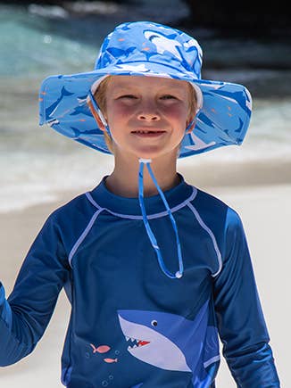 The UPF 50+ Kids Kai Adventure Hat is designed with the utmost sun protection in mind. It features a wide, protective brim that shields the face, ears, and neck from the sun. An adjustable head and chin strap keep the hat secure on windy days, plus a breakaway chin strap ensures extra safety. Enjoy a worry-free adventure with this practical, comfortable and stylish hat!