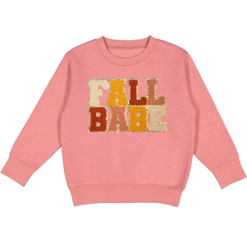 The&nbsp;Fall Babe Patch&nbsp;Sweatshirt is a fun and festive sweatshirt for celebrating Fall! Features: * Crewneck Color:&nbsp;Dusty Rose * Patch&nbsp;Color:&nbsp;Multicolor chenille with gold glitter outline * Material:&nbsp;60% Cotton/40% Polyester Fleece * Features:&nbsp;Tagless inside neck label for an itch-free wear; cozy fleece lining * Fit:&nbsp;Toddler Unisex; True to Size * Care:&nbsp;Machine washable, tumble dry low - Patch Sweatshirts should be washed inside out, lay flat to dry Each sweatshirt 